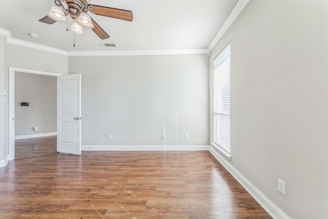 unfurnished room with hardwood / wood-style floors, ceiling fan, and ornamental molding