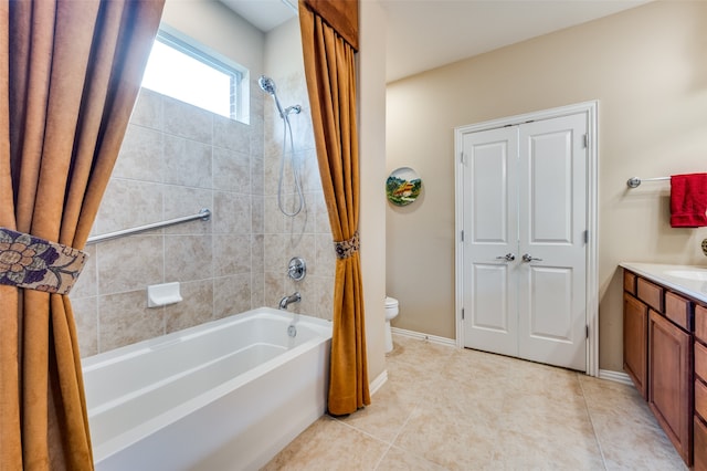 full bathroom with tile patterned flooring, shower / bath combination with curtain, vanity, and toilet