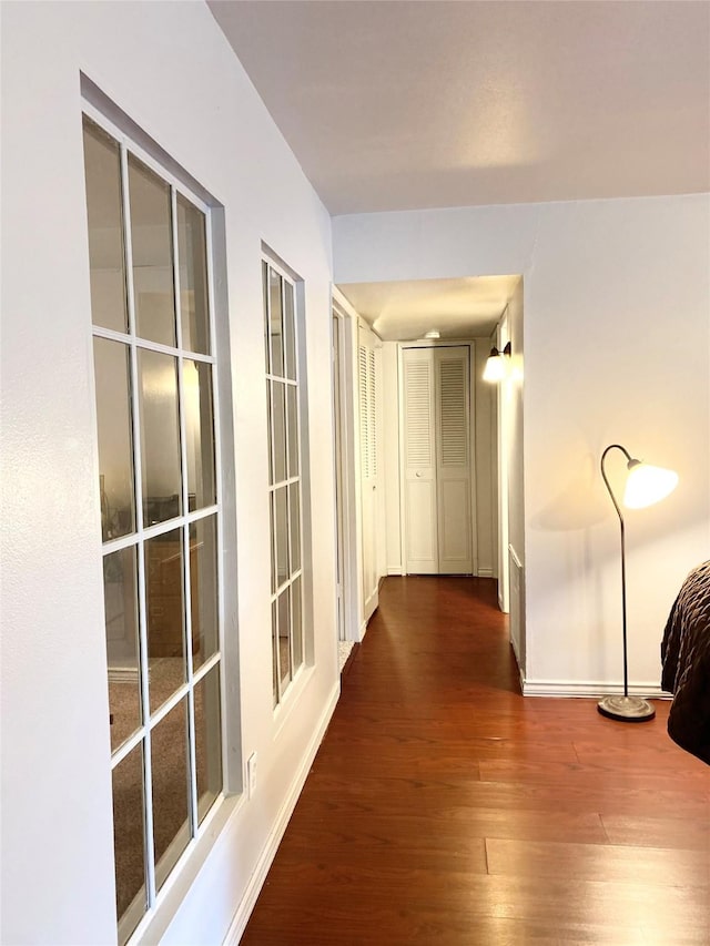 hall featuring dark hardwood / wood-style floors