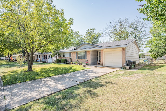 ranch-style house featuring a front yard and a garage