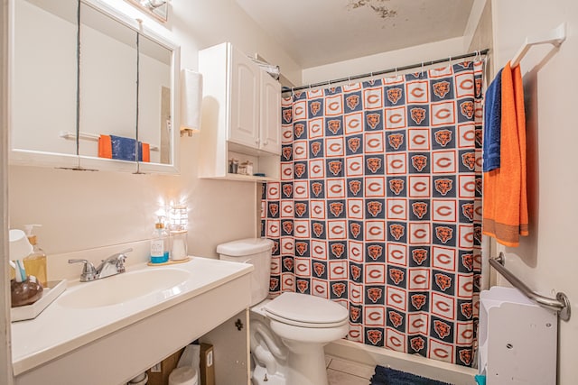 bathroom with tile patterned flooring, a shower with curtain, toilet, and sink