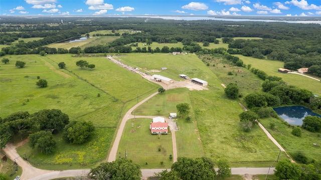 bird's eye view featuring a water view and a rural view