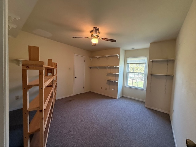 unfurnished bedroom featuring carpet flooring, ceiling fan, and a closet