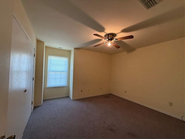 unfurnished room featuring carpet flooring and ceiling fan