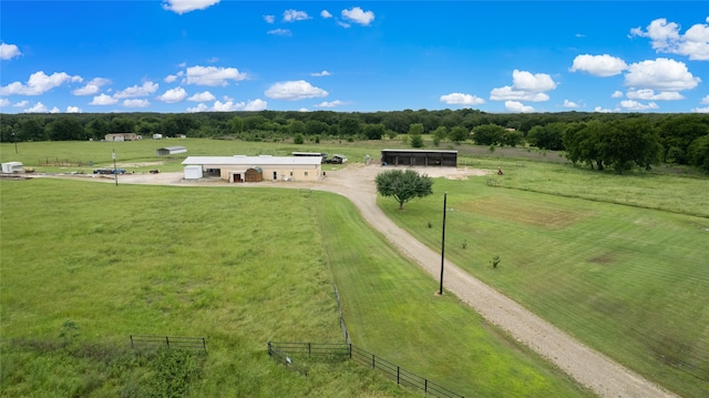 birds eye view of property with a rural view