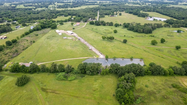 drone / aerial view featuring a water view and a rural view