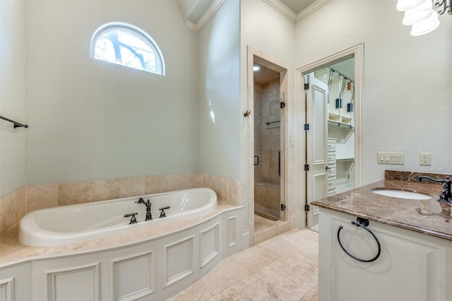 4122 Walnut Meadow Ln, Dallas, TX 75229 - bathroom with a stall shower, a bath, ornamental molding, vanity, and a spacious closet