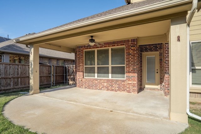 view of patio featuring ceiling fan