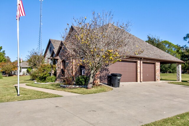 view of property exterior featuring a lawn