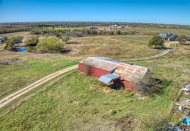 aerial view with a water view and a rural view