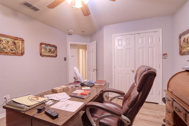 office featuring ceiling fan and light hardwood / wood-style floors