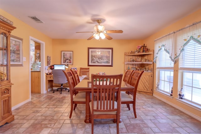 dining room with ceiling fan