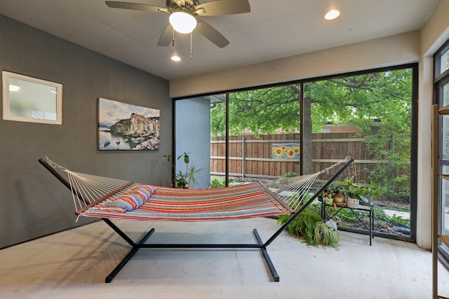 interior space with ceiling fan and plenty of natural light