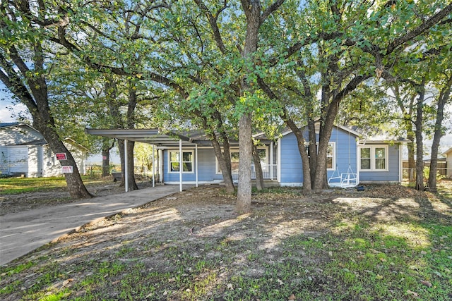 view of front of house with a carport