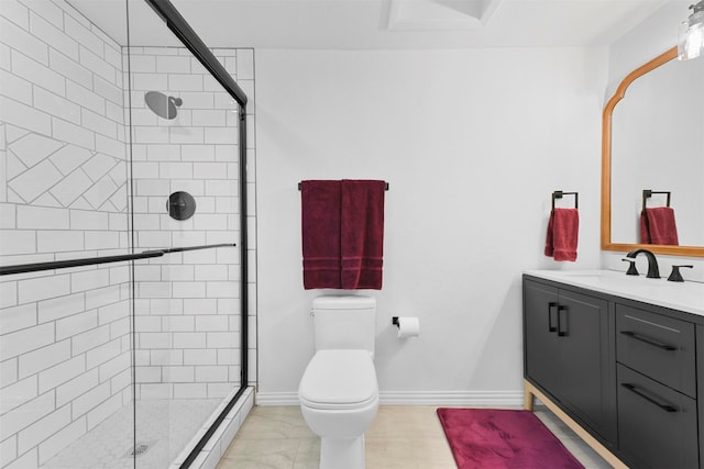 bathroom featuring vanity, toilet, and walk in shower