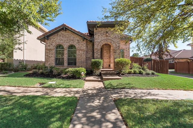 view of front of property with a front lawn