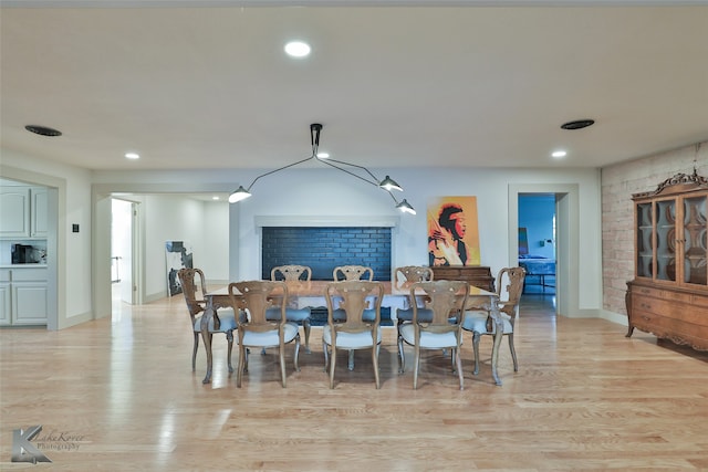 dining space featuring light hardwood / wood-style floors