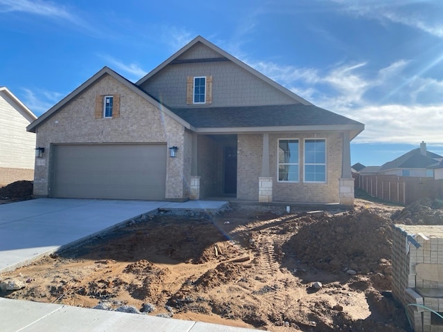 view of front of home with a garage