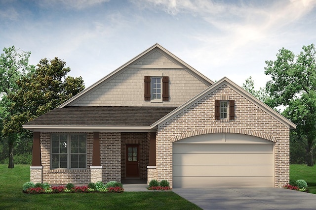 view of front of home featuring a garage and a front lawn