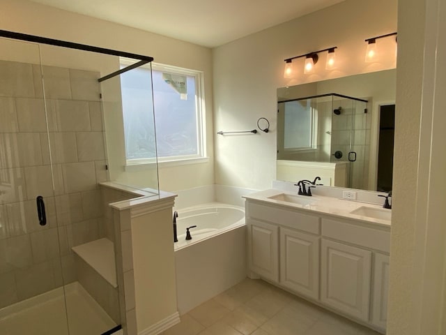 bathroom with tile patterned flooring, vanity, and independent shower and bath