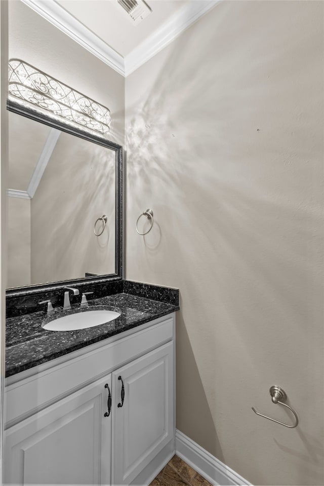 bathroom featuring vanity and crown molding