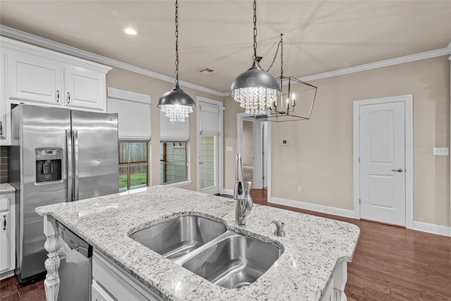 kitchen with sink, stainless steel appliances, dark hardwood / wood-style floors, decorative light fixtures, and white cabinets