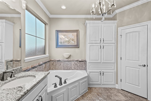 bathroom featuring a tub, vanity, a chandelier, and ornamental molding