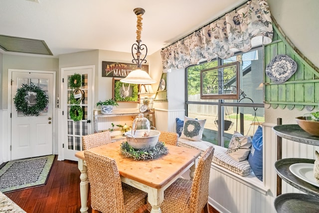 dining area with dark wood-type flooring