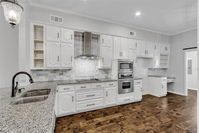 kitchen featuring dark hardwood / wood-style flooring, light stone counters, sink, wall chimney range hood, and white cabinets