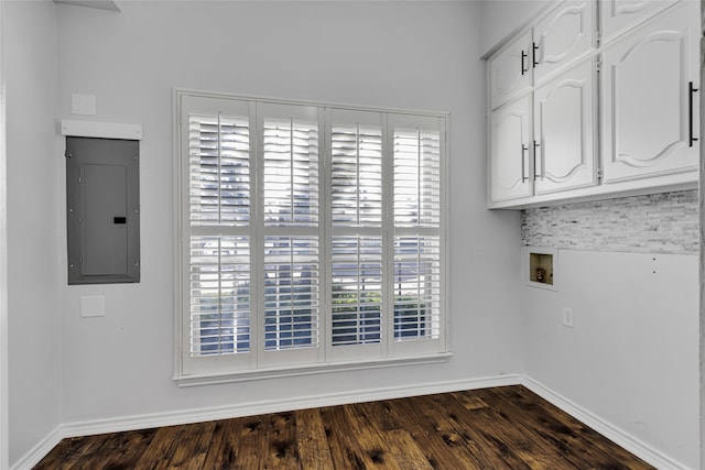 laundry room with cabinets, washer hookup, electric panel, and dark hardwood / wood-style floors