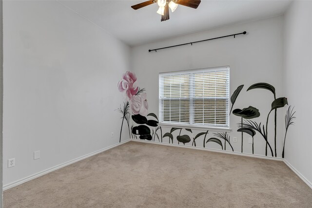 misc room featuring light carpet and ceiling fan