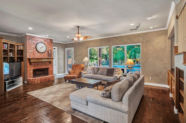 living room with ornamental molding, dark wood-type flooring, and a fireplace