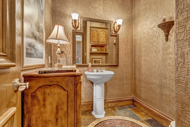 bathroom with tile patterned floors and dual sinks