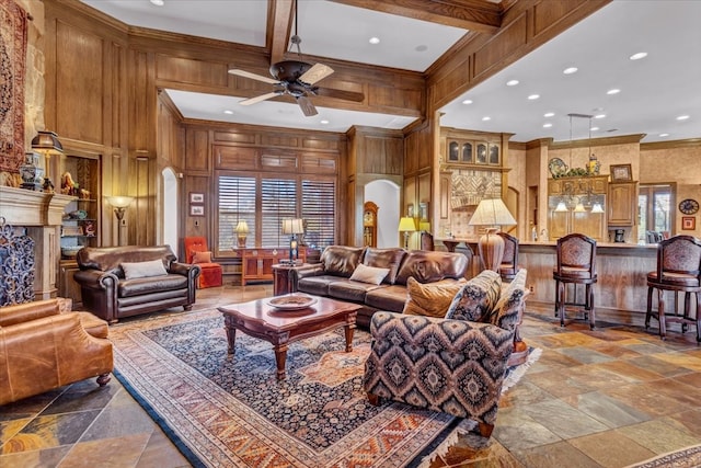 living room with ceiling fan, beam ceiling, wooden walls, and coffered ceiling