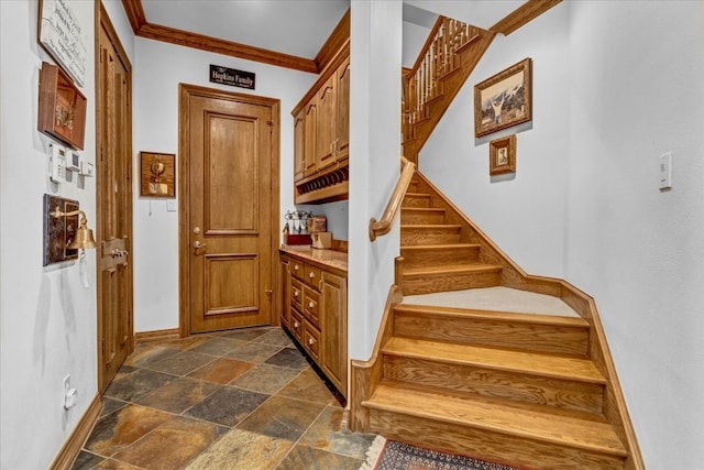 stairs with crown molding