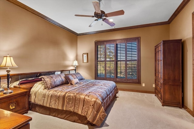 bedroom featuring ceiling fan, crown molding, and light colored carpet