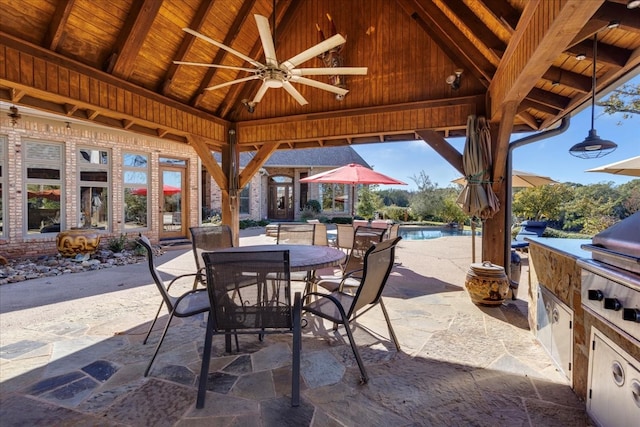 view of patio / terrace with a gazebo, area for grilling, and ceiling fan