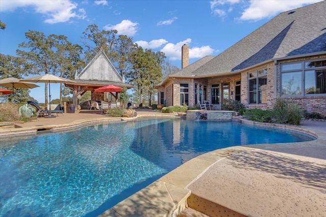 view of pool with a patio area