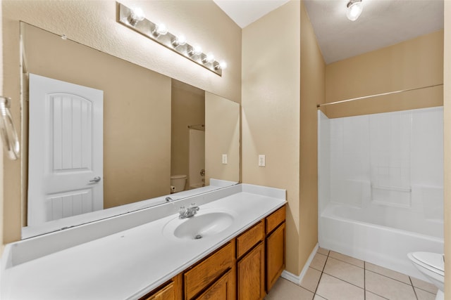 full bathroom featuring tile patterned floors, vanity, toilet, and bathing tub / shower combination