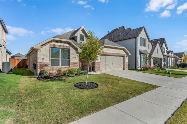 view of front of house featuring cooling unit, a front lawn, and a garage