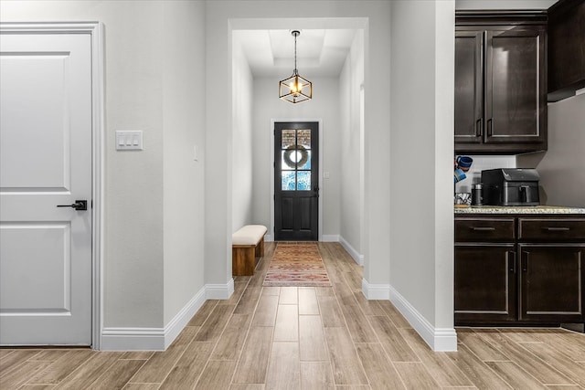 entryway with light hardwood / wood-style floors