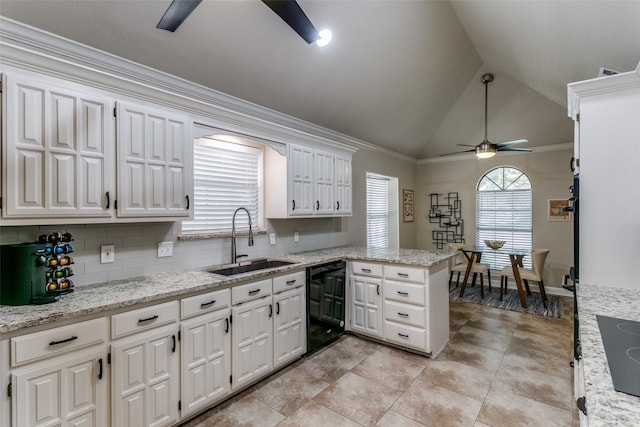 kitchen with white cabinetry, sink, kitchen peninsula, lofted ceiling, and black appliances