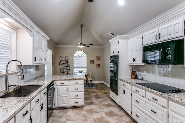 kitchen with sink, kitchen peninsula, crown molding, vaulted ceiling, and black appliances