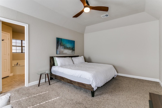 bedroom with carpet, vaulted ceiling, and ceiling fan