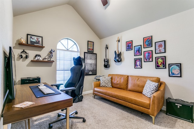 home office featuring carpet flooring and vaulted ceiling