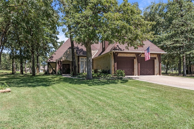 view of front facade featuring a garage and a front yard