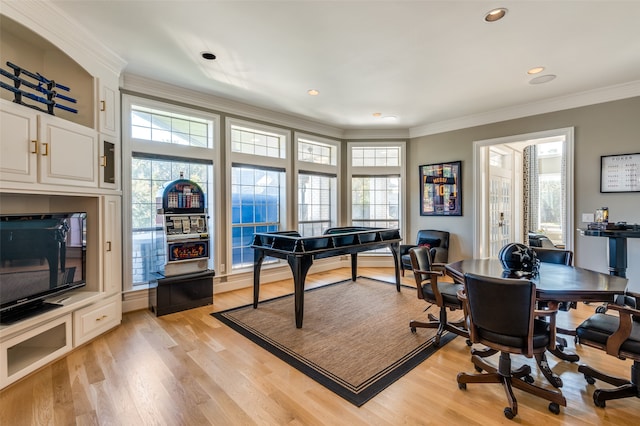 home office featuring ornamental molding and light wood-type flooring