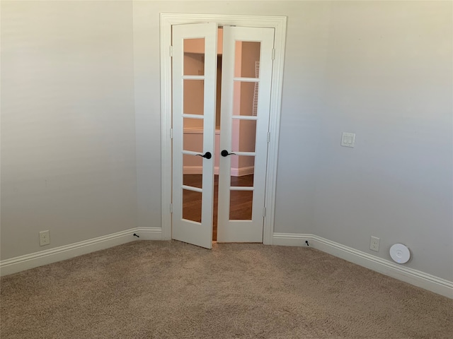 unfurnished room with carpet floors