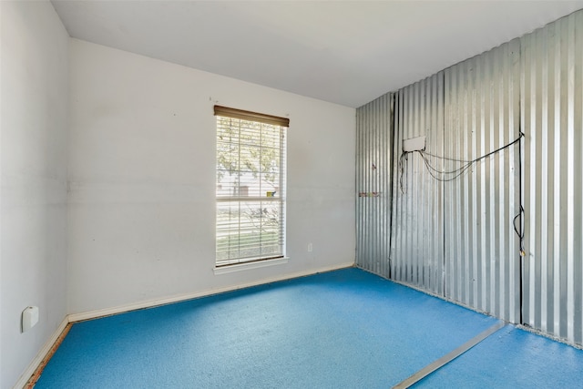 unfurnished room featuring carpet floors