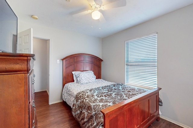 bedroom featuring dark hardwood / wood-style floors and ceiling fan